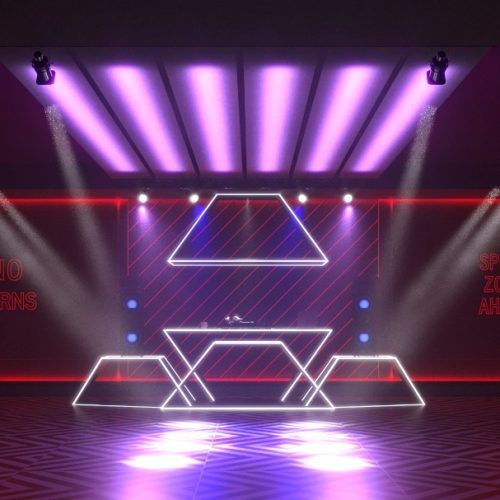فضای DJ با نورپردازی بنفش و قرمز و طراحی هندسی در دیوار و میز.